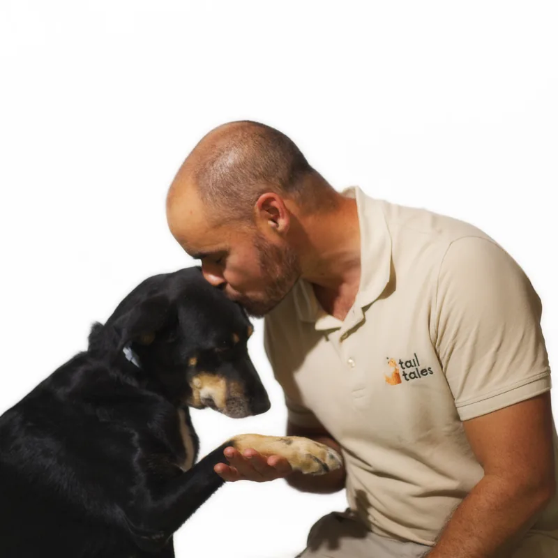 Carlos, Head Trainer, with his dog
